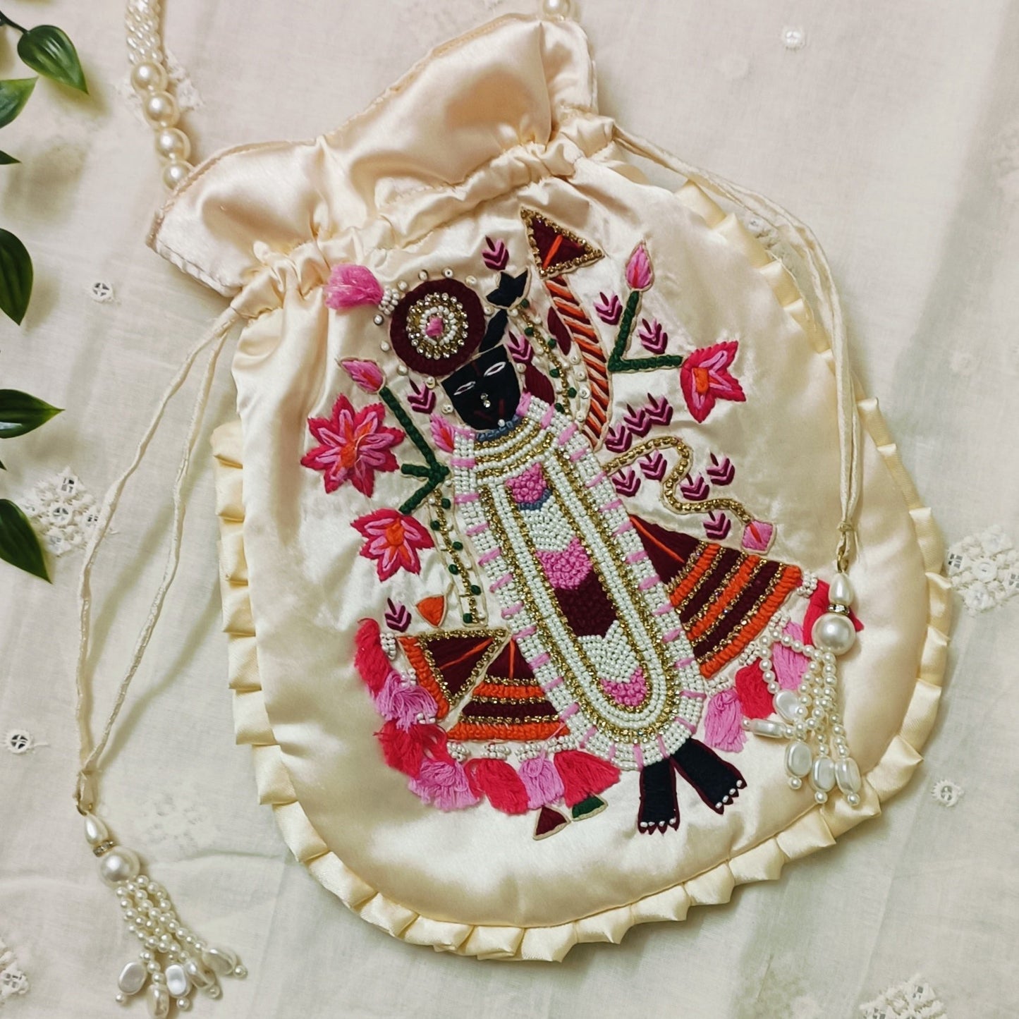 Buy Cream Peach Shreenathji Potli Bag | Godhuli
