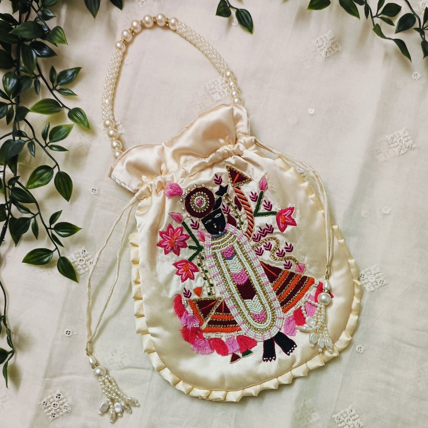 Buy Cream Peach Shreenathji Potli Bag | Godhuli