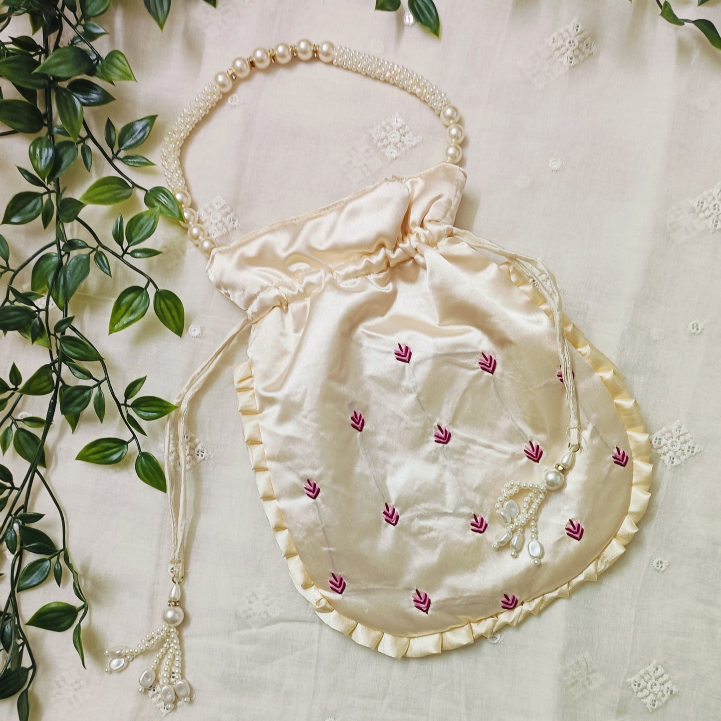 Buy Cream Peach Shreenathji Potli Bag | Godhuli