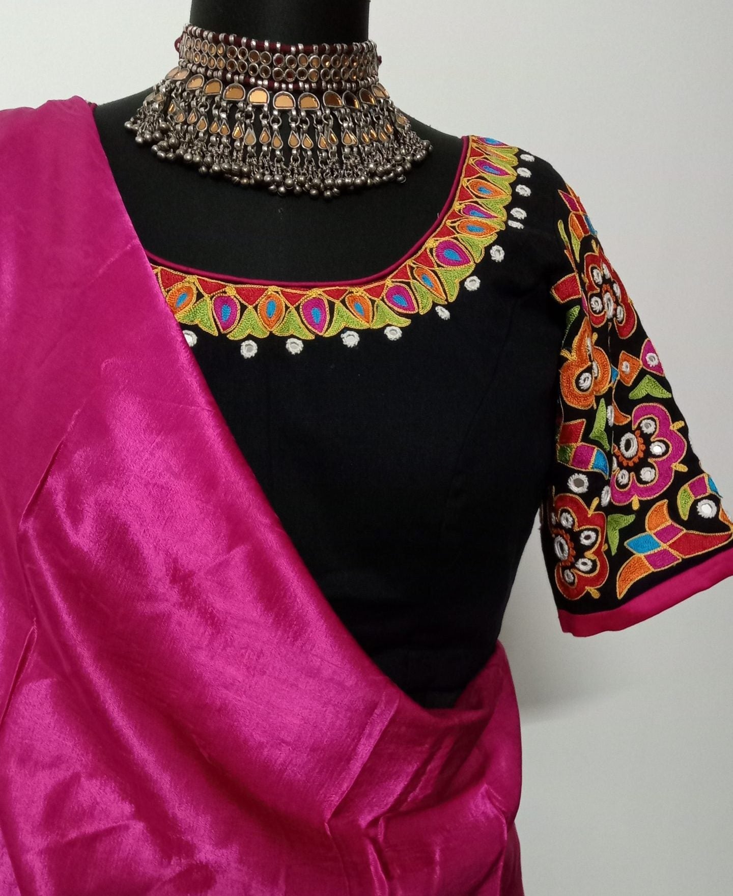 heavy aari work embroidery and mirror work black blouse