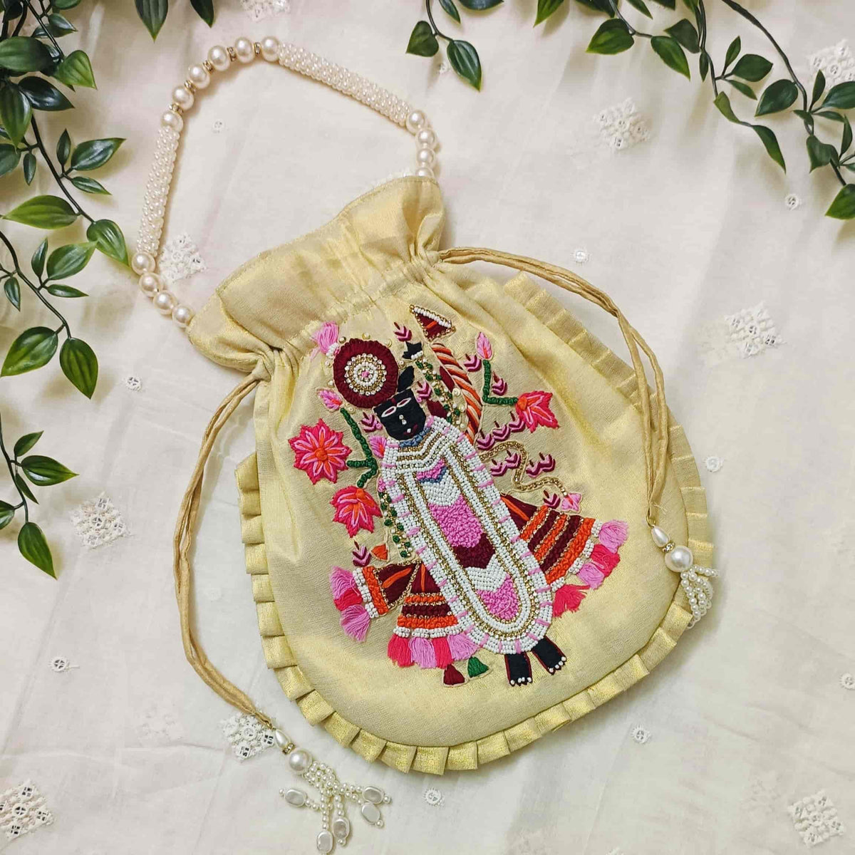 Buy Golden Tissue Shreenathji Potli Bag