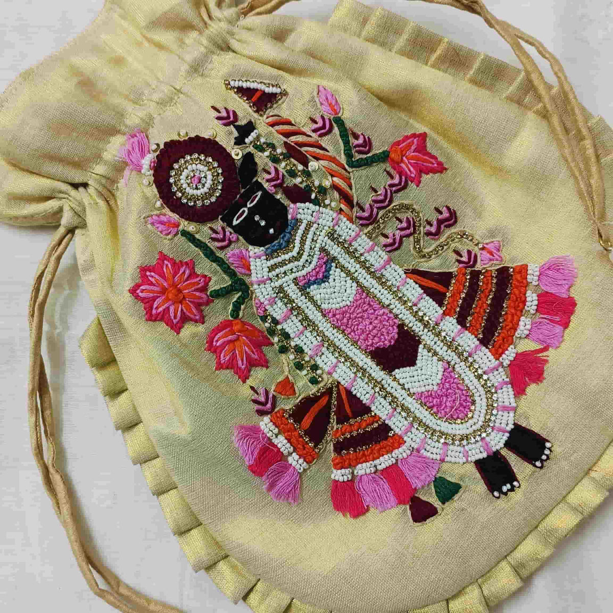 Buy Golden Tissue Shreenathji Potli Bag