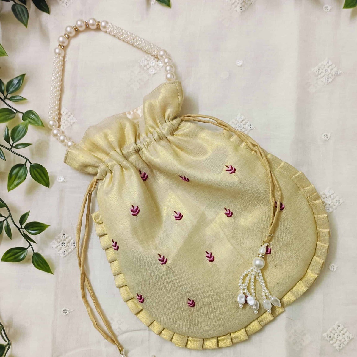Buy Golden Tissue Shreenathji Potli Bag
