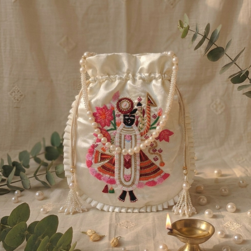 Buy Ivory Colour Shreenathji Potli Bag | Godhuli