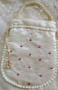 Buy Ivory Colour Shreenathji Potli Bag | Godhuli