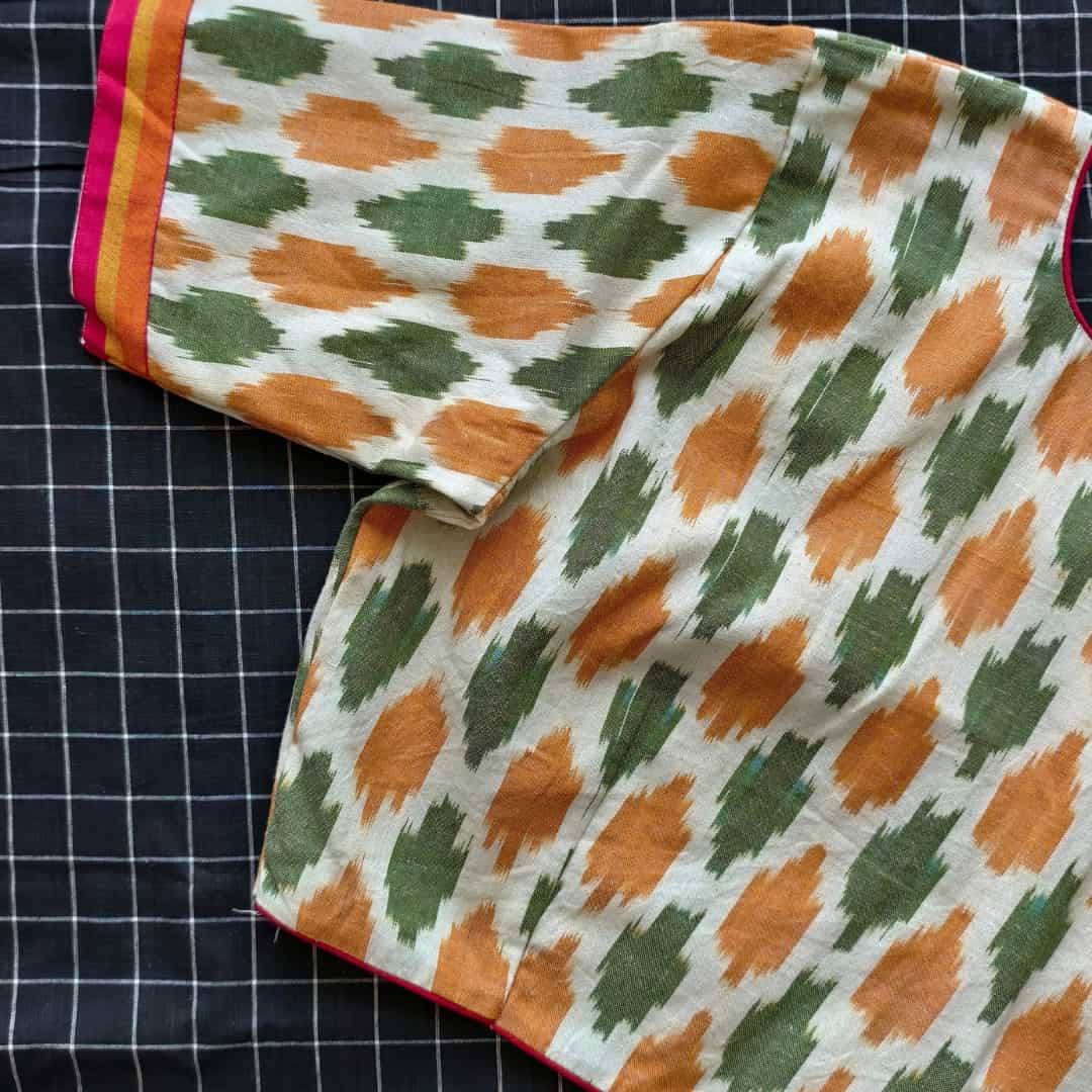 Cream blouse with Orange Green ikat Weave Blouse | Godhuli