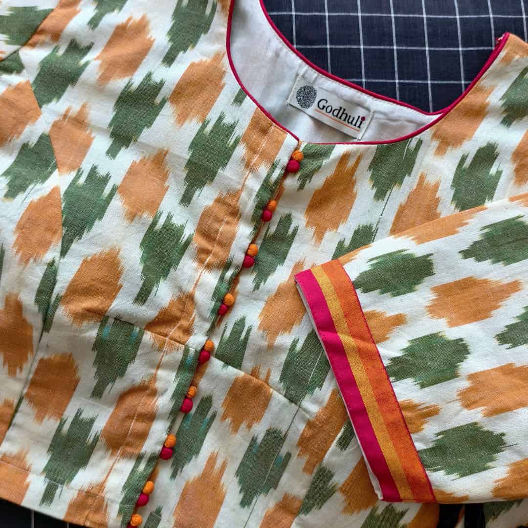 Cream blouse with Orange Green ikat Weave Blouse | Godhuli