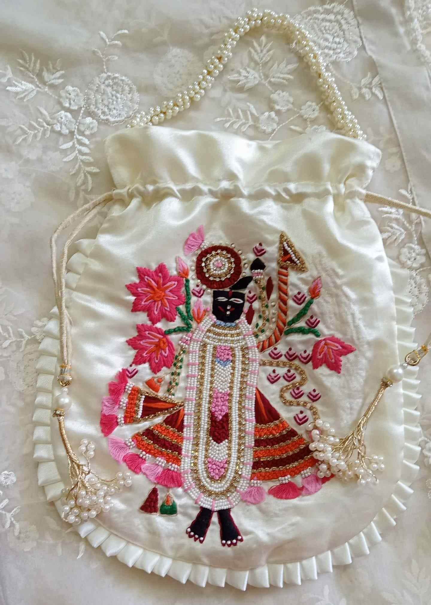 Buy Ivory Colour Shreenathji Potli Bag | Godhuli