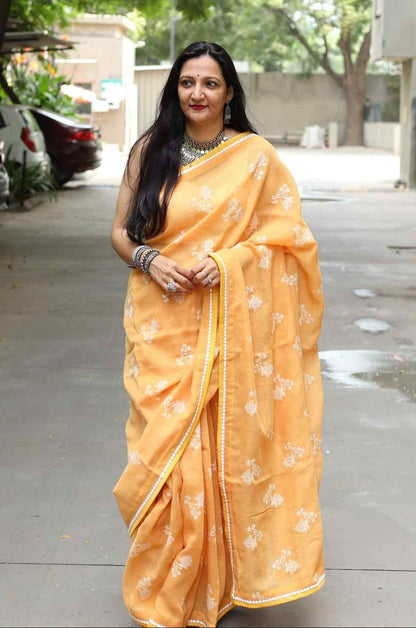 Apricot Yellow Embroidered Linen Saree