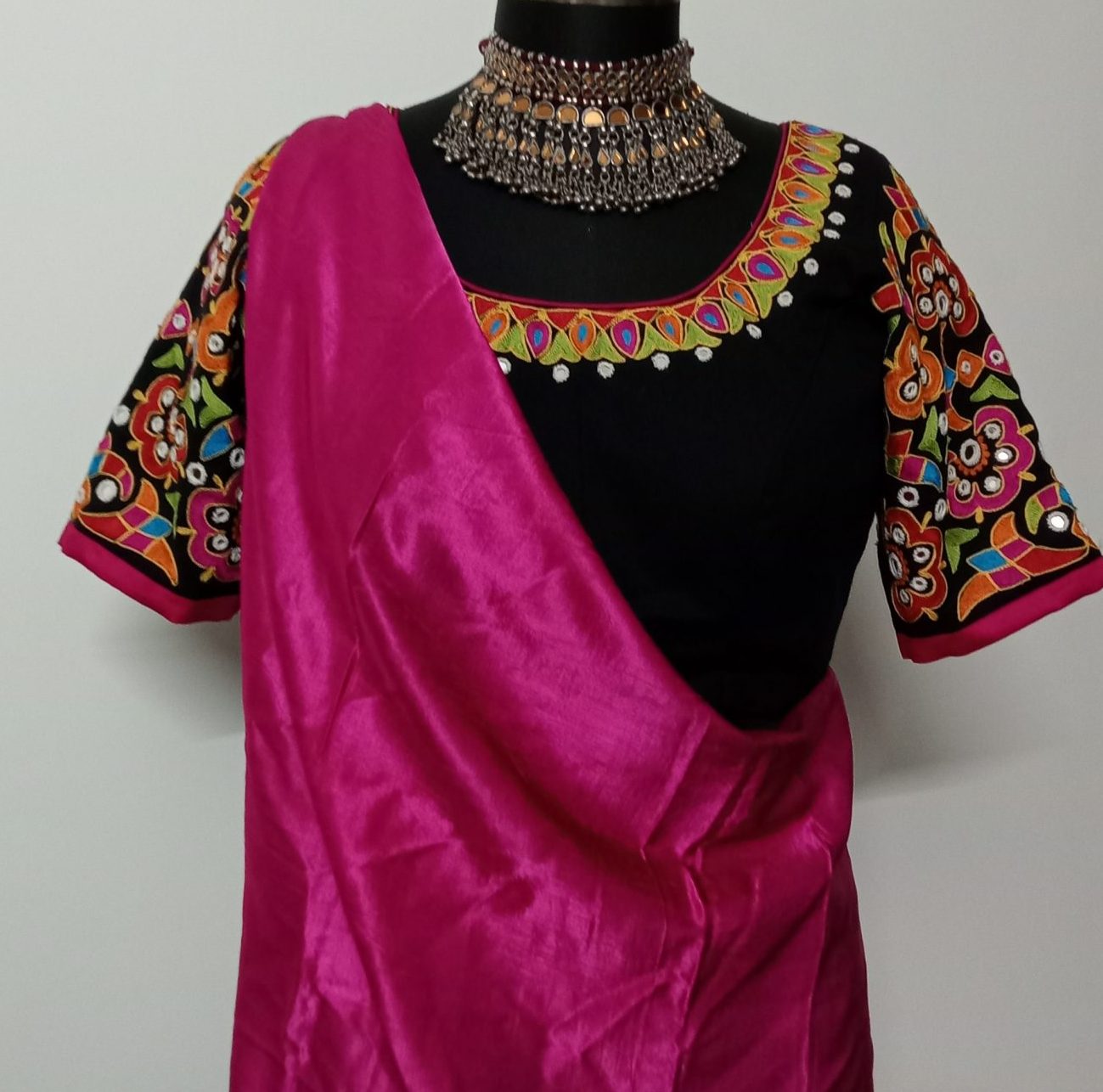 heavy aari work embroidery and mirror work black blouse