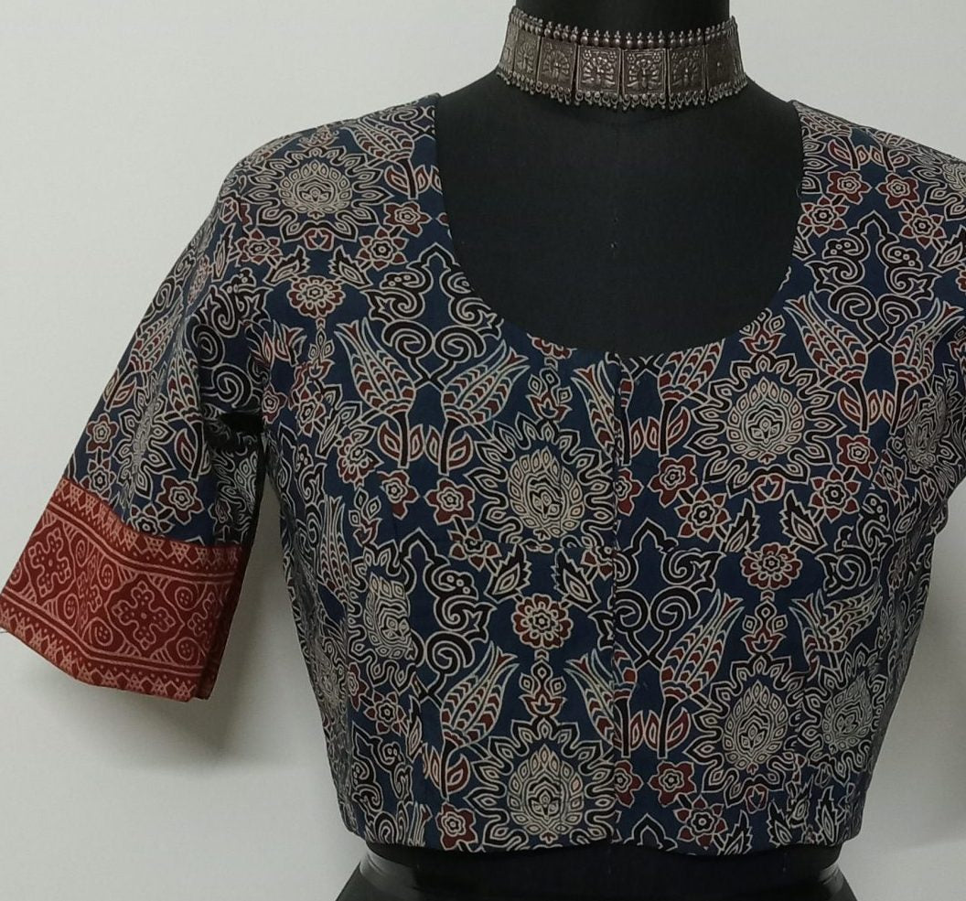Printed indigo ajrakh blouse with maroon gamathi border sleeves