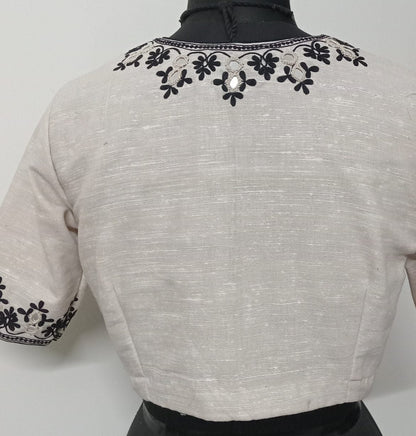beige embroidered mirror work blouse