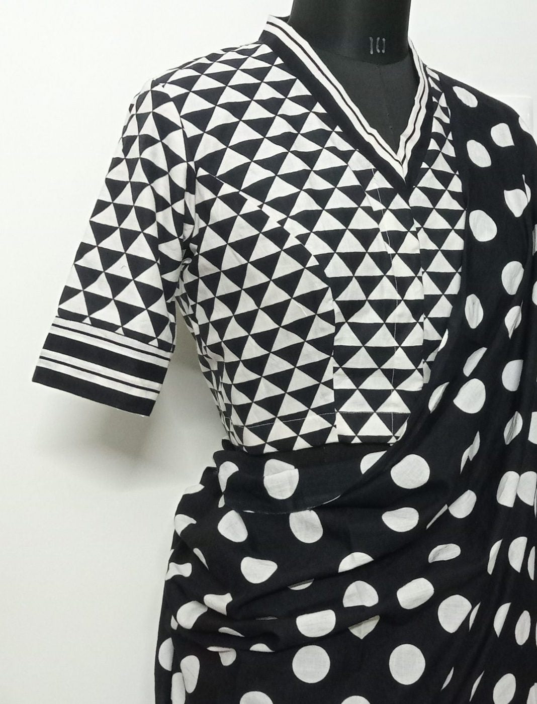 Monochrome triangular geometric print black and white blouse