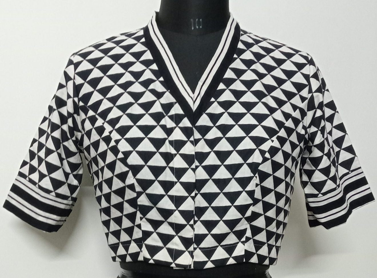 Monochrome triangular geometric print black and white blouse