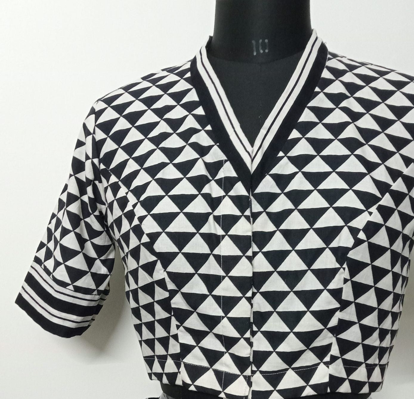 Monochrome triangular geometric print black and white blouse