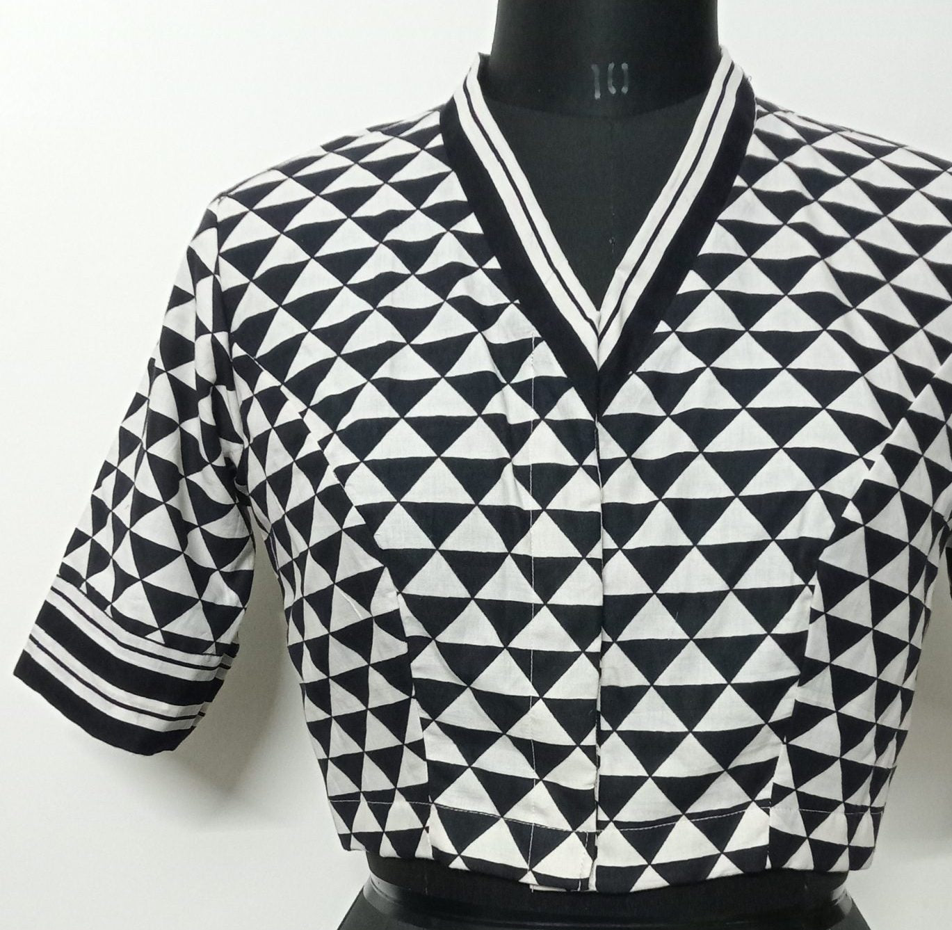 Monochrome triangular geometric print black and white blouse