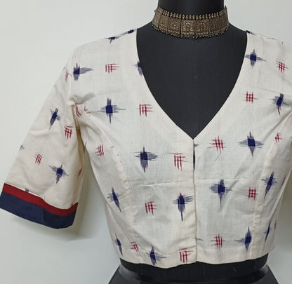 off white double ikat with blue red motifs