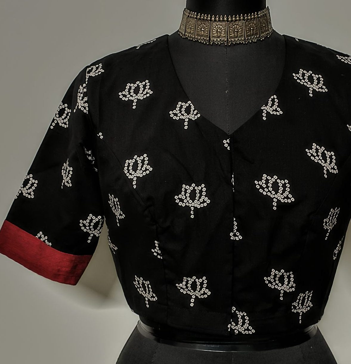 Lotus print black cotton blouse