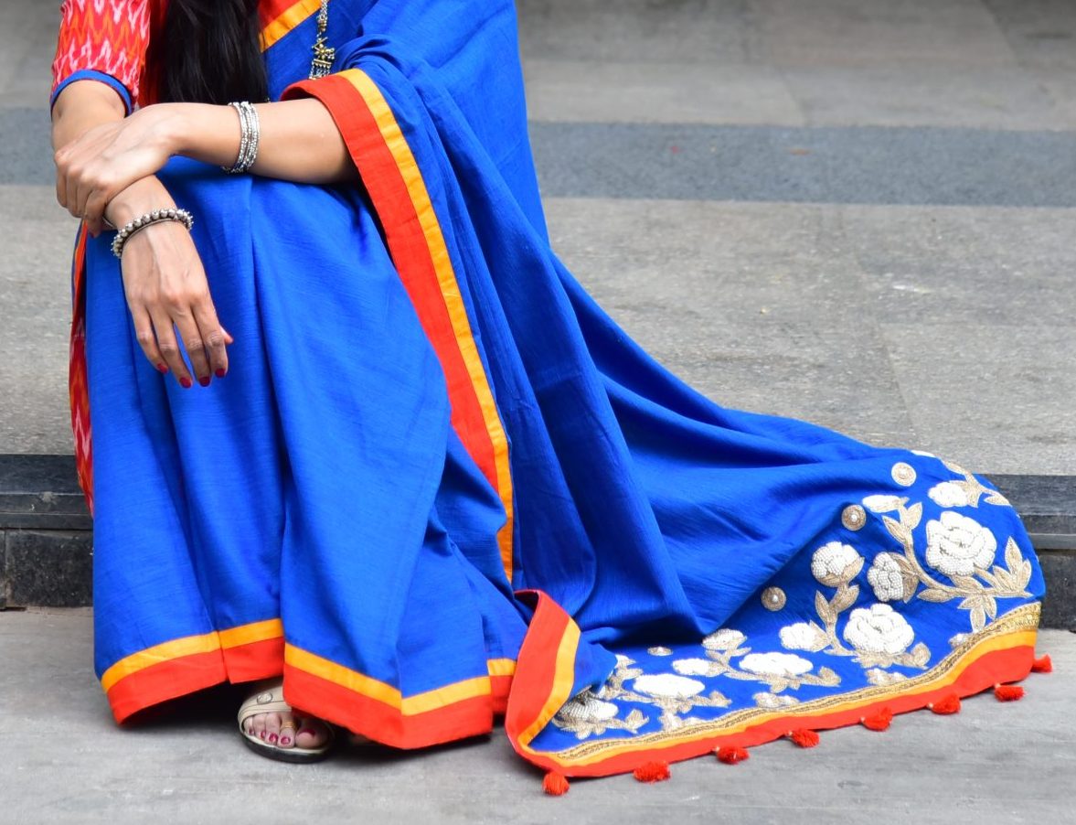 The DRESS SHOP - DS 47 525 Navy ink blue saree paired with sequins blouse  set. Price:- INR 34800/- Shipping Worldwide. Fabric - Satin Georgette. Work  - Swarovski, Sequins, Resham Threads and