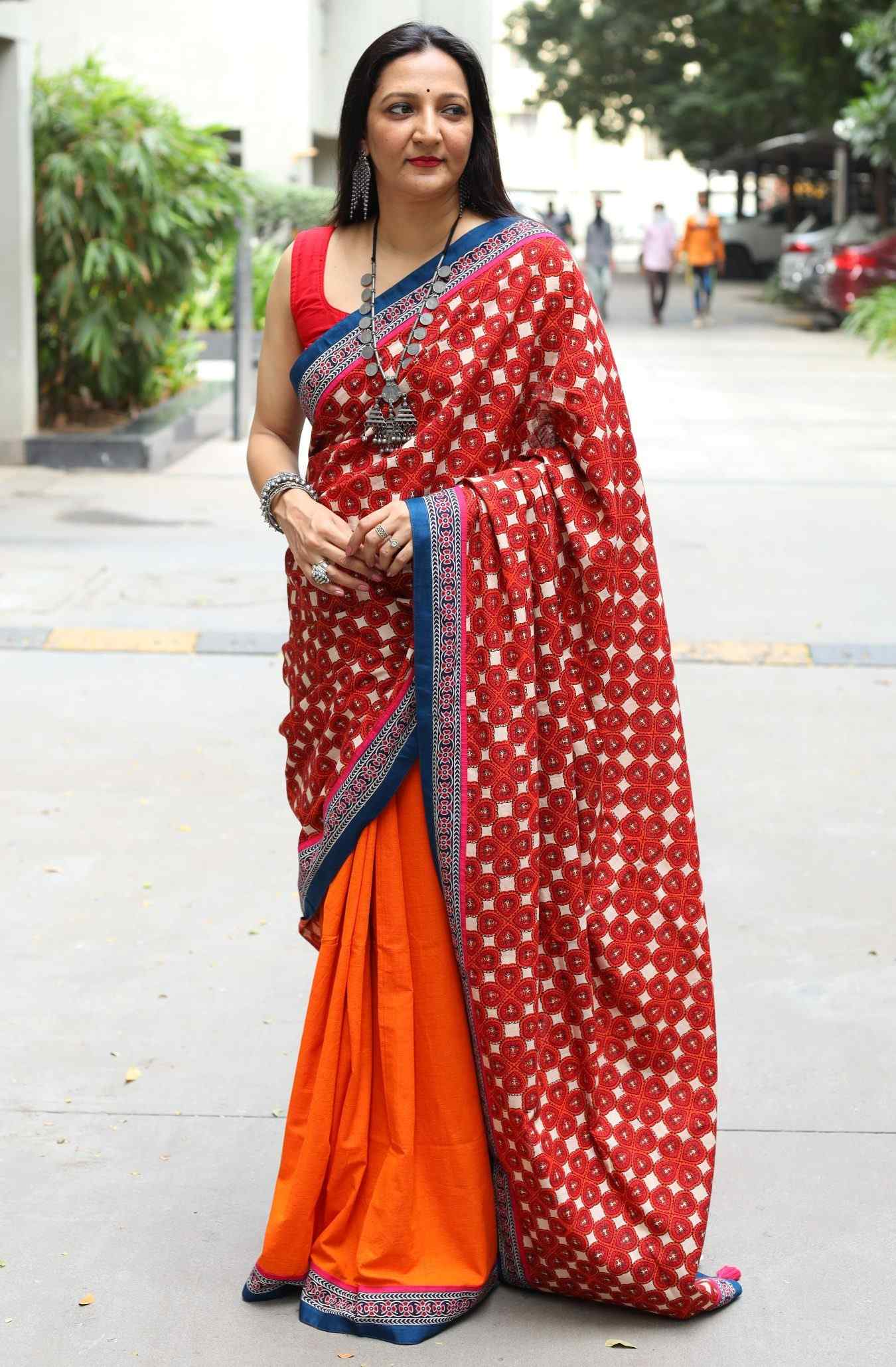 Orange half and half saree with Printed Pallu