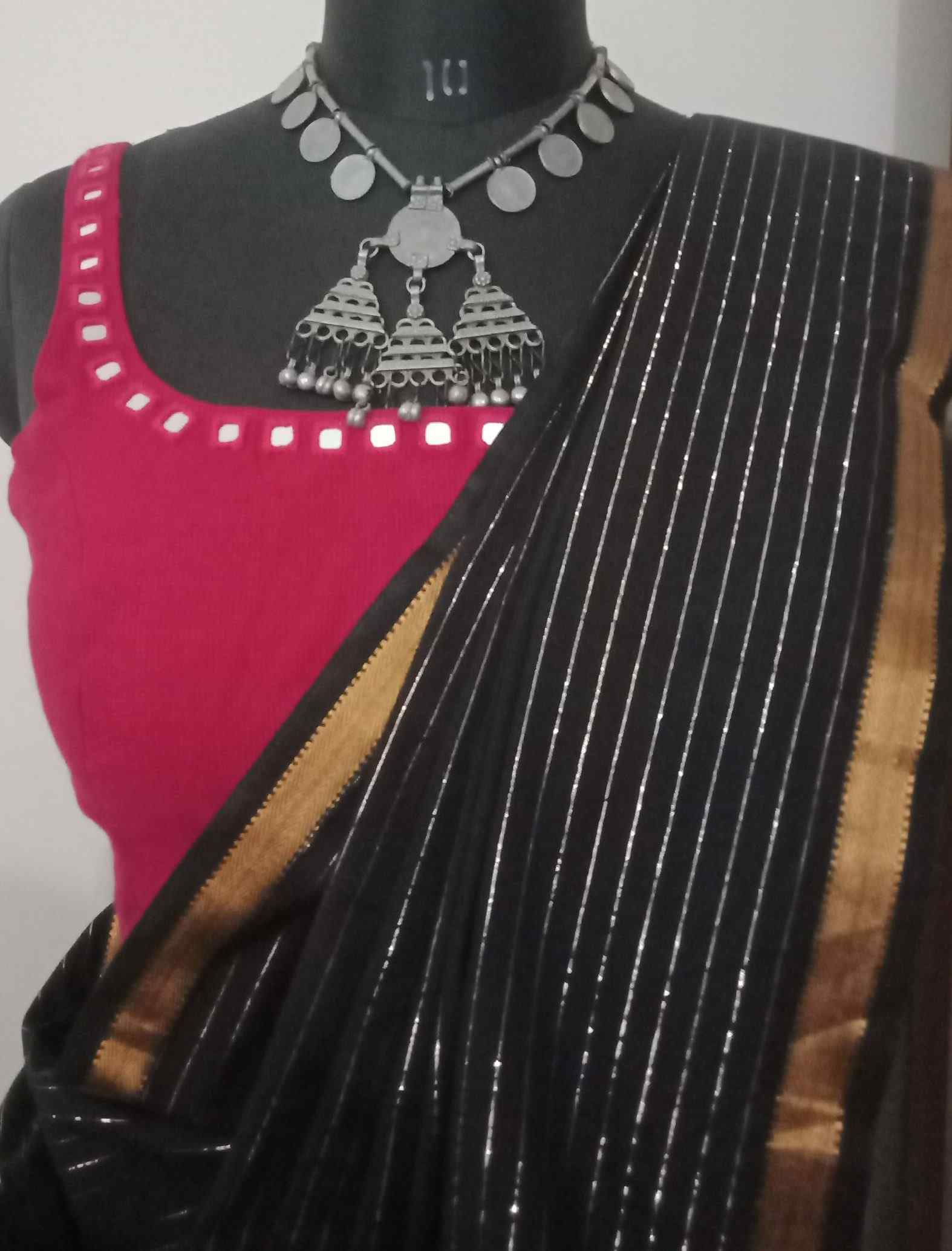 Beautiful Black Saree With Golden Blouse for the Perfect Combination