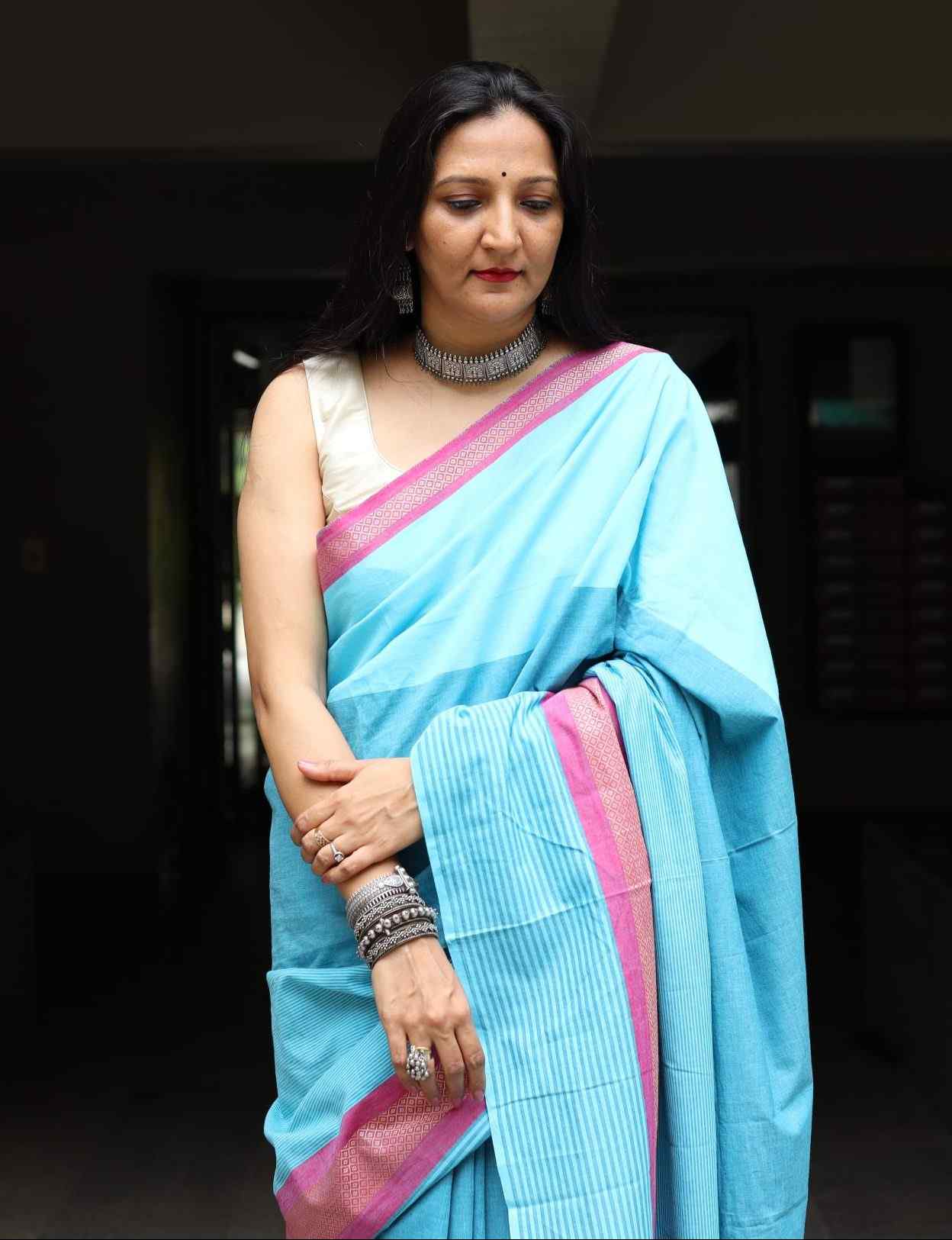 Turquoise Blue Saree with Pink Border